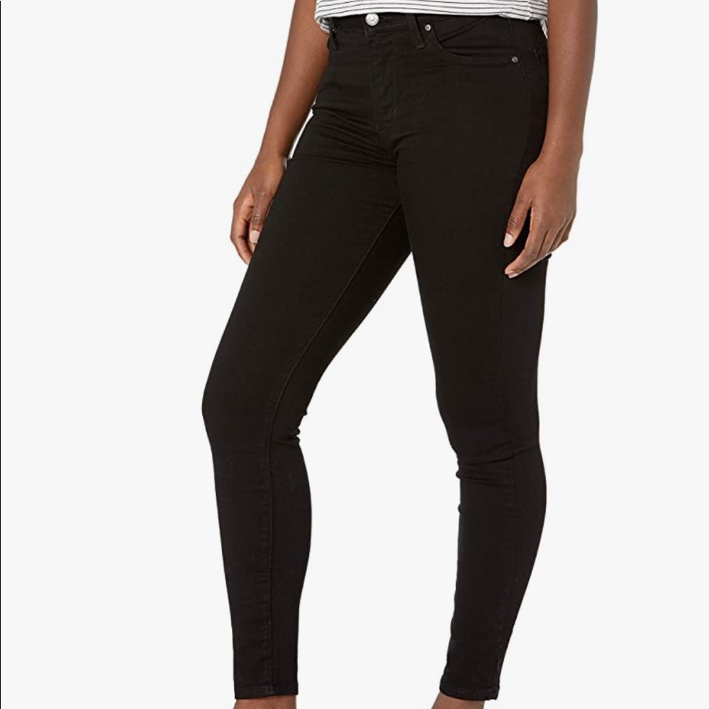 Levi’s 721 High Rise black skinny jeans. 25